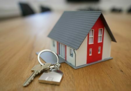 a key chain and a house