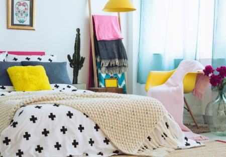 a table with a basket and a basket with objects on it