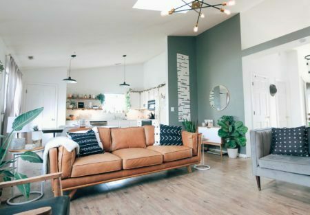 a living room with a couch and a table