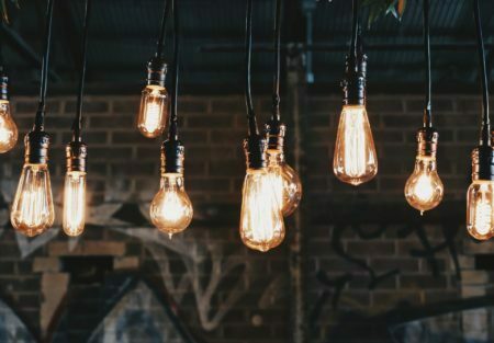 a group of light bulbs from a ceiling