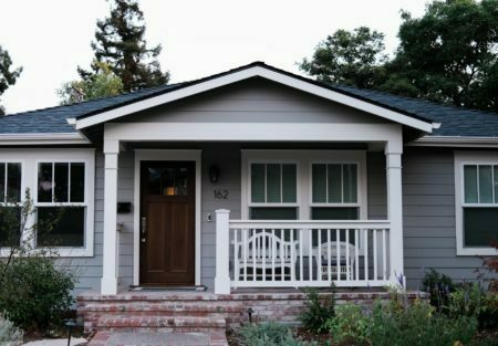 a house with a white railing