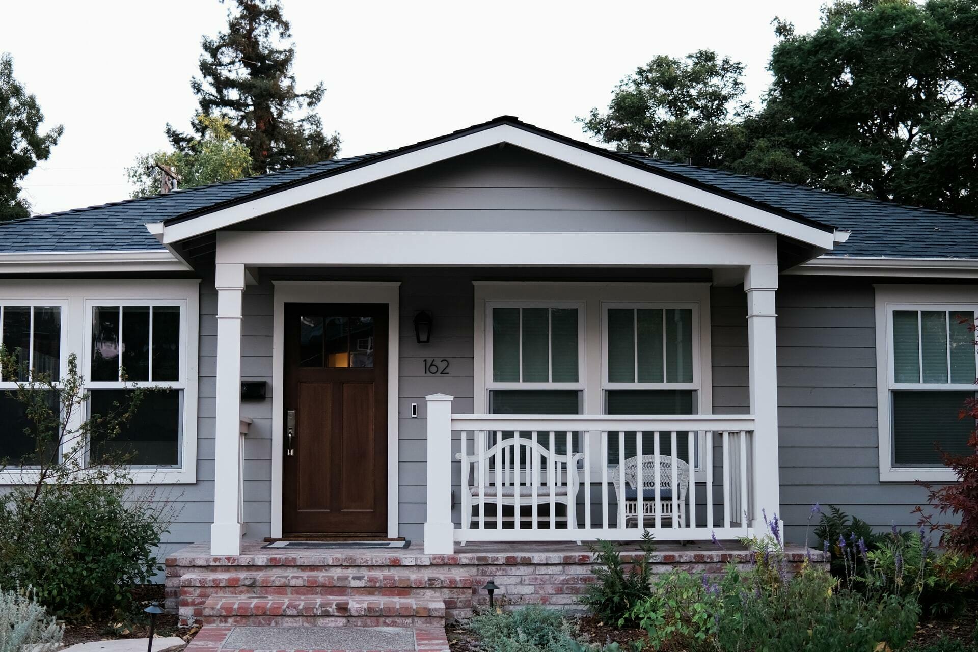 a house with a white railing