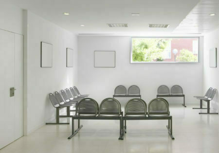 a room with chairs and a table