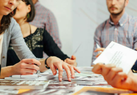 a few people discussing something