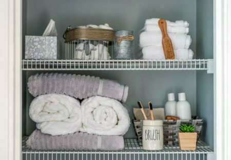 Neatly organized bathroom shelves