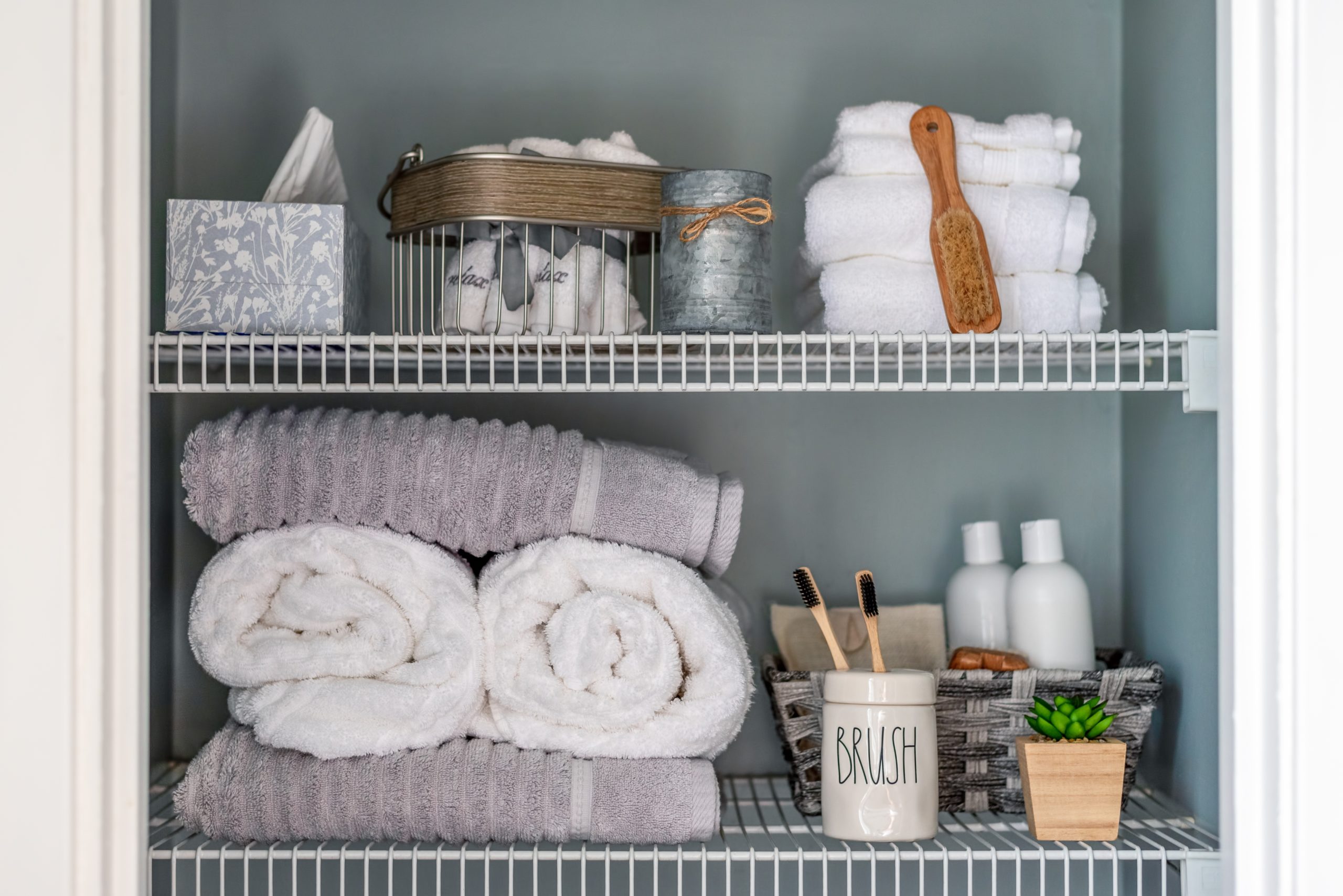 Neatly organized bathroom shelves