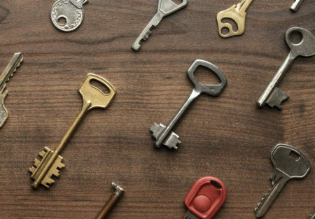 Many Different Keys On Wooden Table